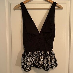 Black Low Back Cross Strap Peplum Top